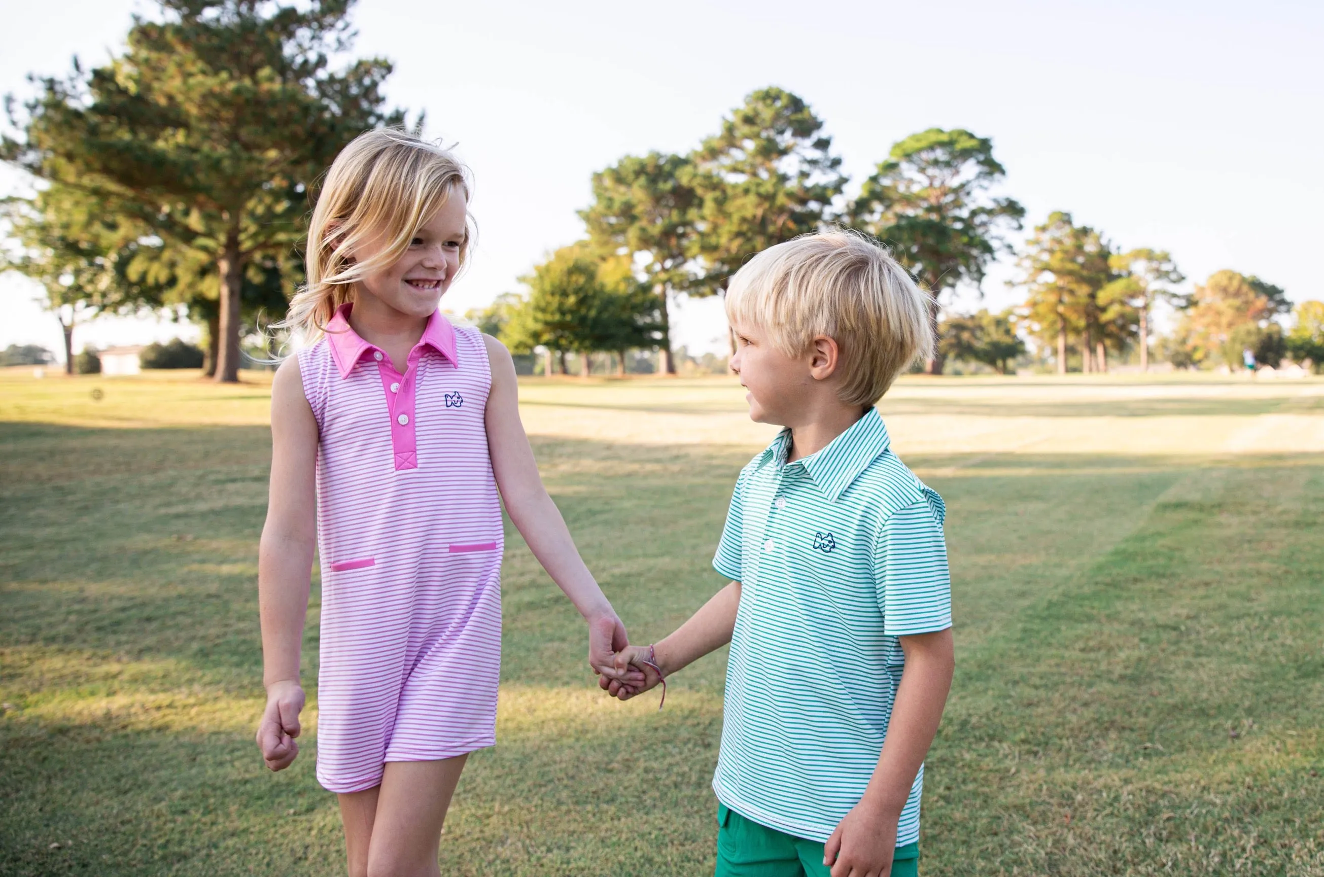 Girls' Sleeveless Pro Performance Polo Dress in Fuchsia Pink Stripe