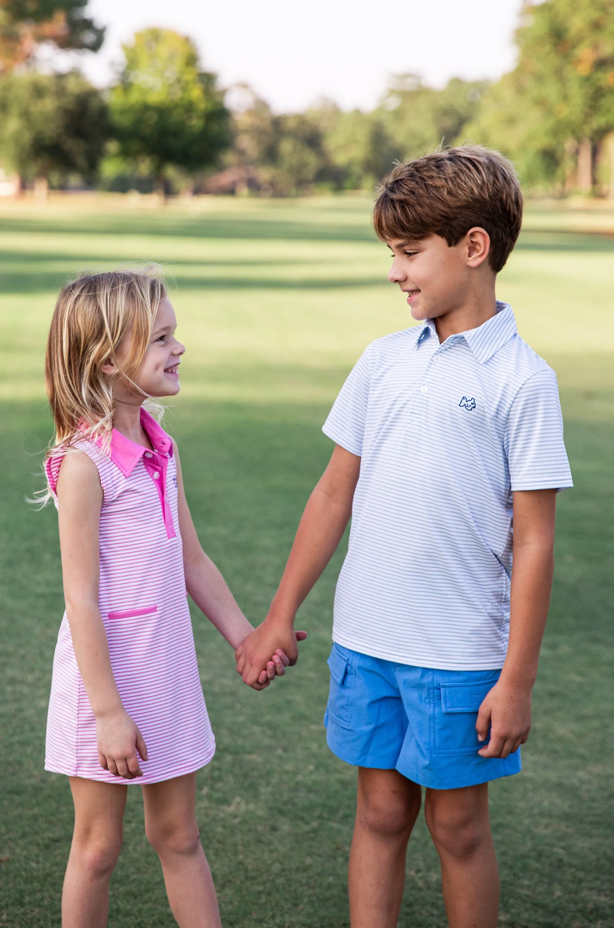 Girls' Sleeveless Pro Performance Polo Dress in Fuchsia Pink Stripe